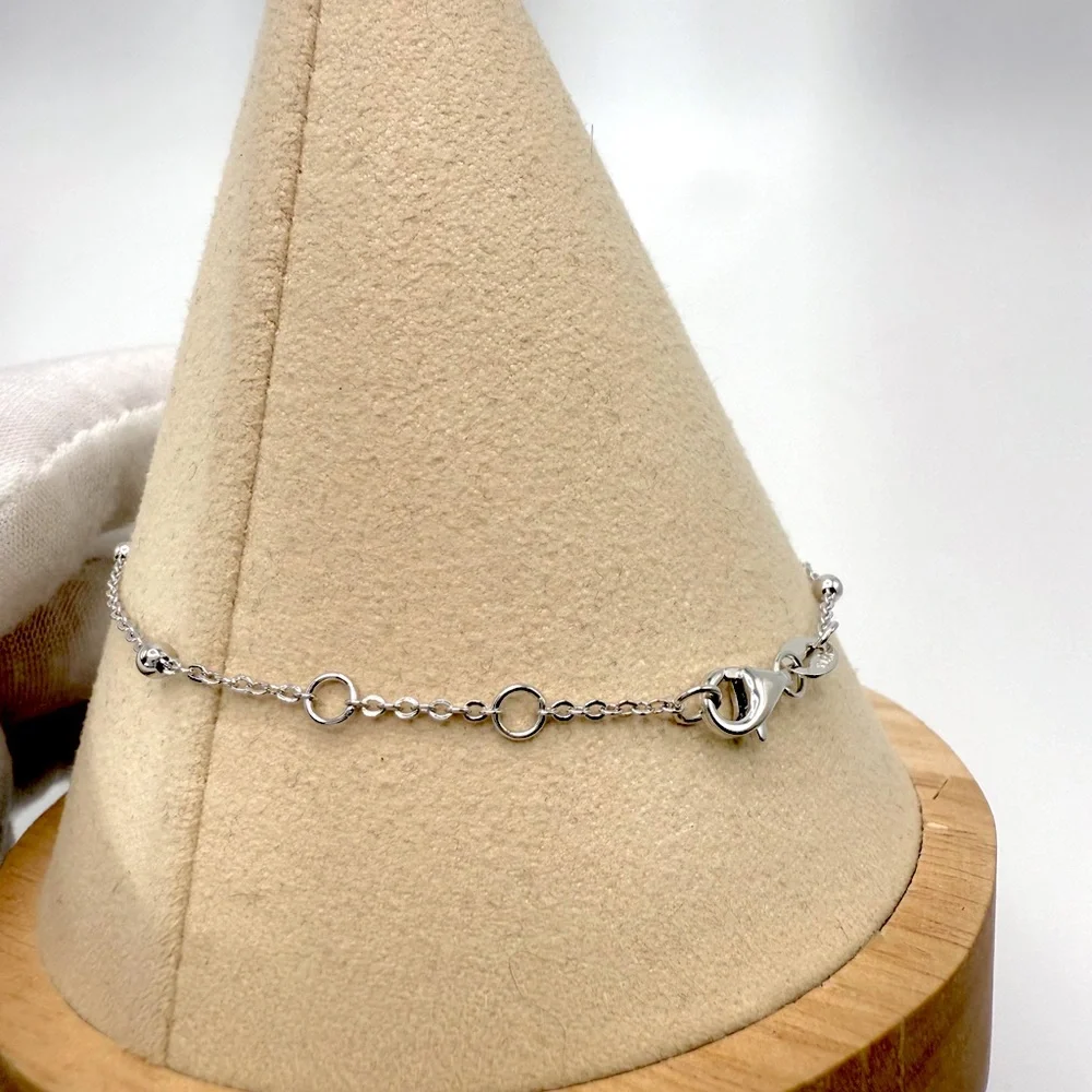 6.75” Dainty .925 Sterling Silver Dangle Eye, Cross and Hamsa Charm Bracelet